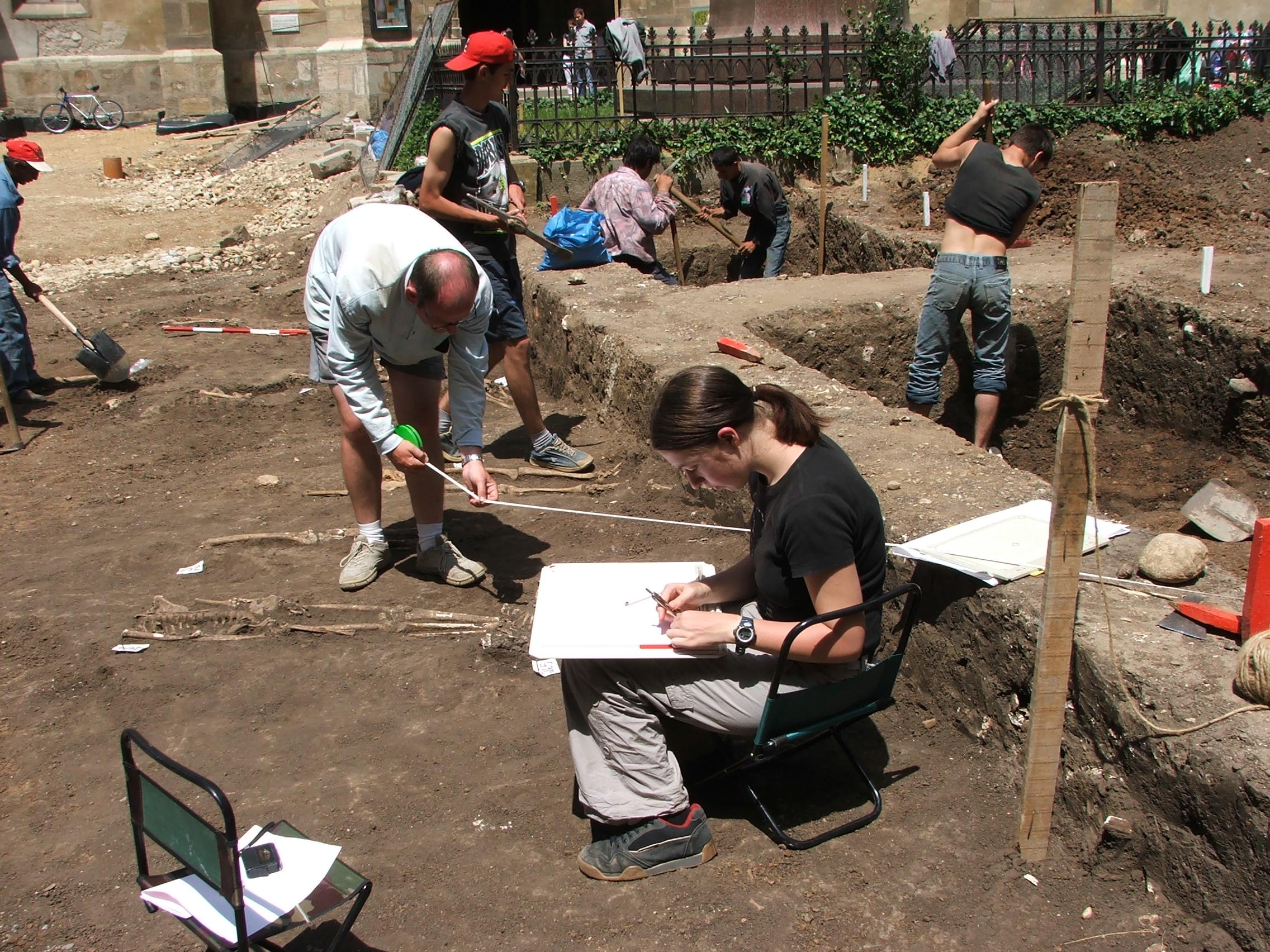 A group of Projects Abroad volunteers participating in data collection at an excavation site during their volunteer archaeology work in Romania. A group of Projects Abroad volunteers collecting data at an excavation site during their volunteer archaeology work in Romania.